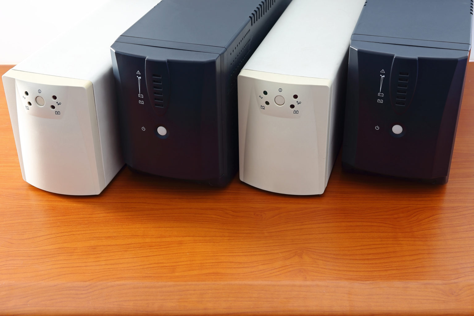 Uninterruptible power supply (UPS) devices in a row.